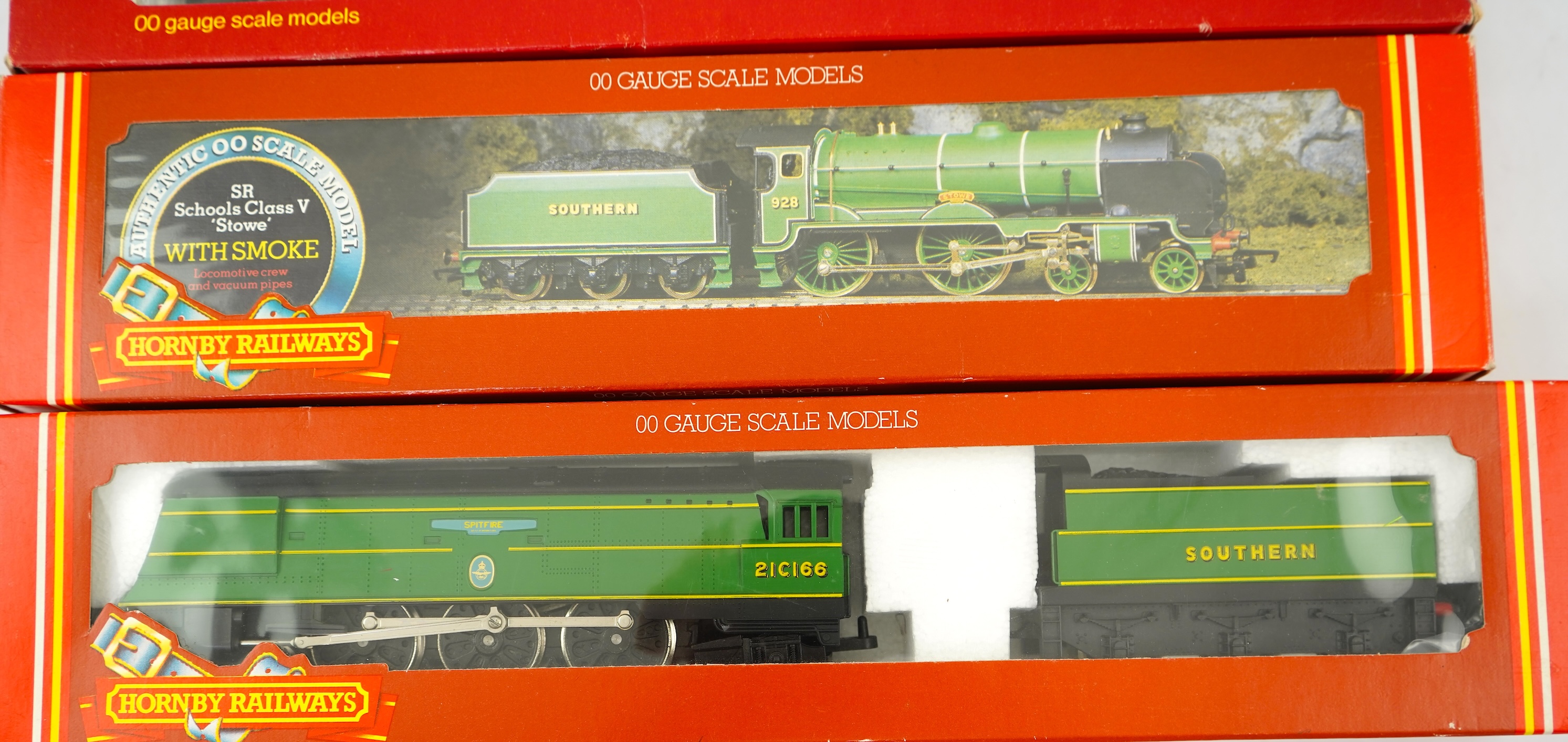 Three boxed Hornby Railways 00 gauge Sputhern Railway tender locomotives; a Battle of Britain Class, Spitfire 21C166, (R374), a Schools Class, Stowe 928, (R380), and a Class N15, Sir Dinadan 795 (R154)